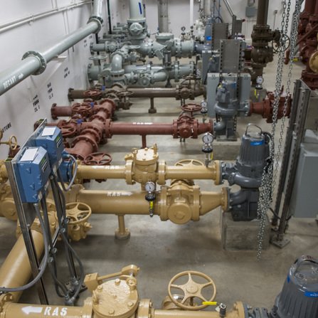 Various colored pipes used for wastewater management