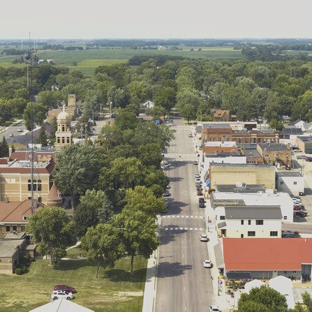 Aerial view of downtown with buildings and trees forming a vibrant community