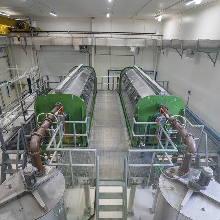 Interior of water treatment facility with multiple water tanks